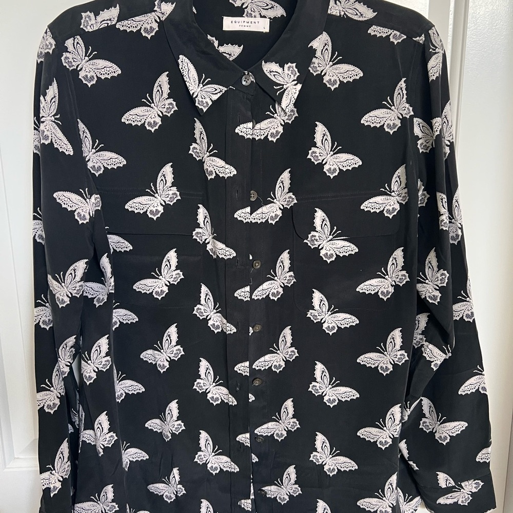 Equipment Black Blouse with White Butterfly Design